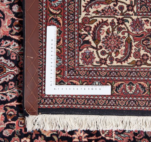 Close-up detail of New Bijar rug from Iran / Persia showing Wool weave