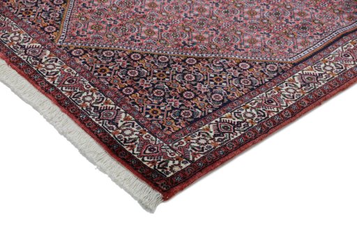 Backside of handmade New Bijar rug showing knot structure and weave density