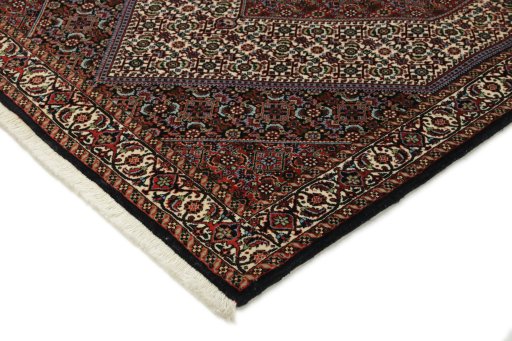 Backside of handmade New Bijar rug showing knot structure and weave density