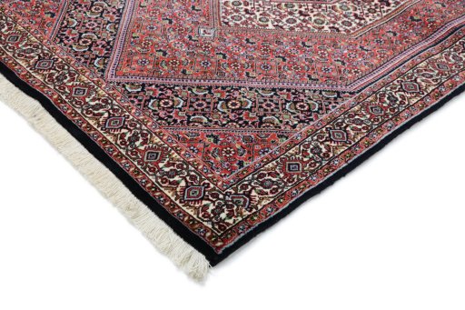 Backside of handmade New Bijar rug showing knot structure and weave density
