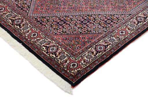 Backside of handmade New Bijar rug showing knot structure and weave density