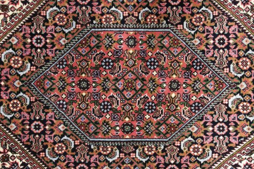 Close-up detail of New Bijar rug from Iran / Persia showing Wool weave