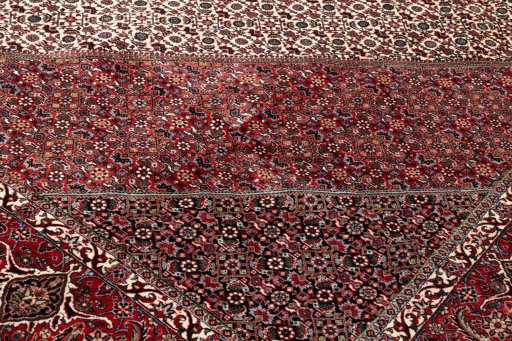 Backside of handmade New Bijar rug showing knot structure and weave density