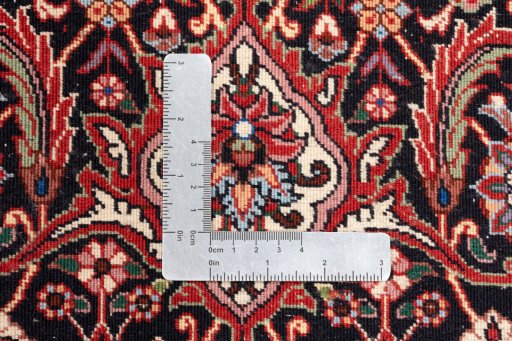 Backside of handmade New Bijar rug showing knot structure and weave density
