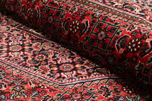Close-up detail of New Bijar rug from Iran / Persia showing Wool weave
