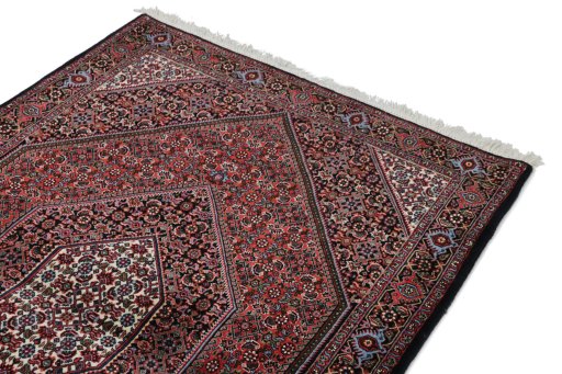 Corner detail of New Bijar rug showing border pattern and Wool pile