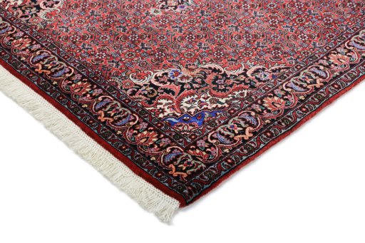 Backside of handmade New Bijar rug showing knot structure and weave density