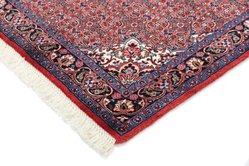 Backside of handmade New Bijar rug showing knot structure and weave density