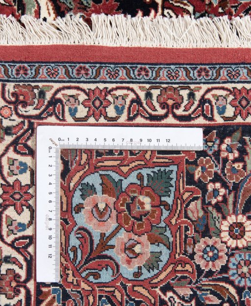 Corner detail of New Bijar rug showing border pattern and Wool pile