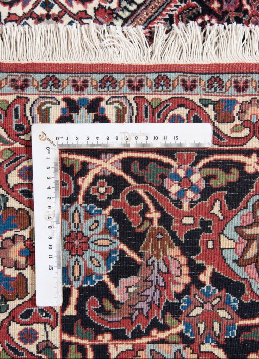 Corner detail of New Bijar rug showing border pattern and Wool pile