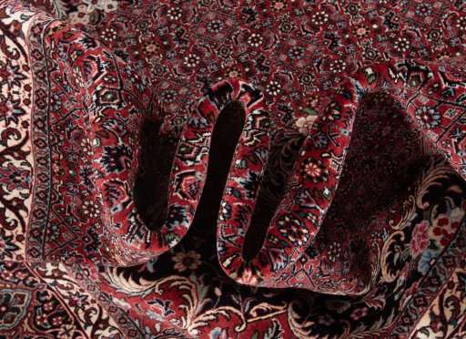 Corner detail of New Bijar rug showing border pattern and Wool pile