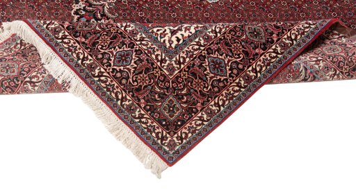 Backside of handmade New Bijar rug showing knot structure and weave density