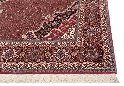 Backside of handmade New Bijar rug showing knot structure and weave density