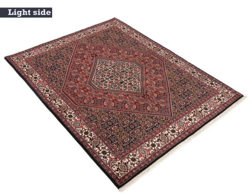 Backside of handmade 1990s Bijar rug showing knot structure and weave density