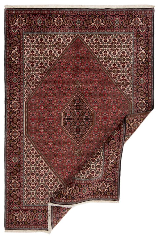 Backside of handmade New Bijar rug showing knot structure and weave density