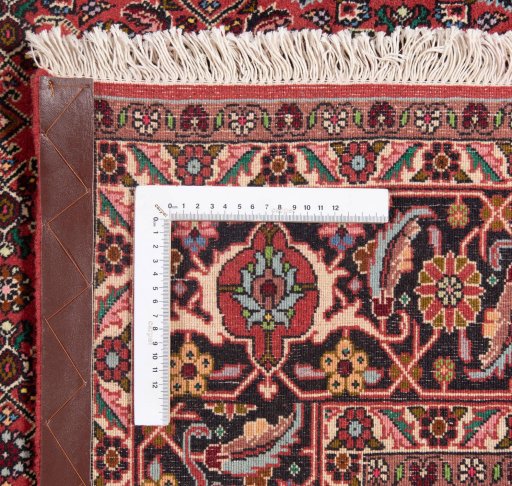 Backside of handmade New Bijar rug showing knot structure and weave density