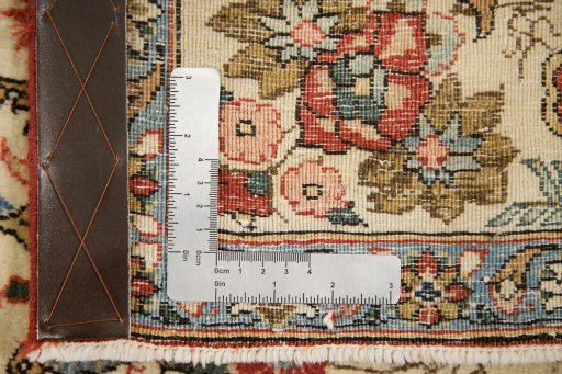 Full view of 1960s Ghom rug from Iran / Persia, 224 × 138 cm in Cream tones