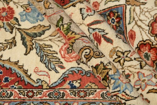 Corner detail of 1960s Ghom rug showing border pattern and Wool pile