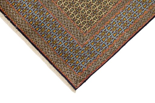 Backside of handmade 1960s Ghom rug showing knot structure and weave density