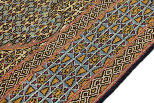 Close-up detail of 1960s Ghom rug from Iran / Persia showing Wool weave