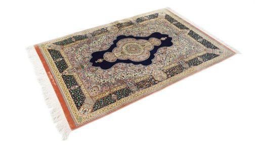 Close-up detail of New Ghom rug from Iran / Persia showing Silk weave