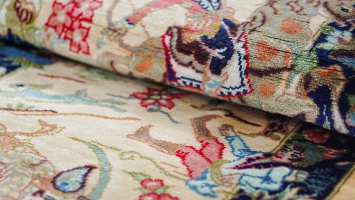 Central medallion detail of New Ghom rug from Iran / Persia