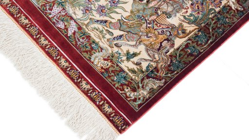 Backside of handmade New Ghom rug showing knot structure and weave density