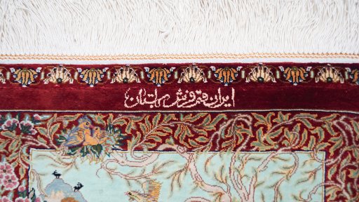 Close-up detail of New Ghom rug from Iran / Persia showing Silk weave
