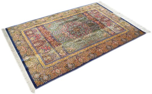 Corner detail of New Ghom rug showing border pattern and Silk pile
