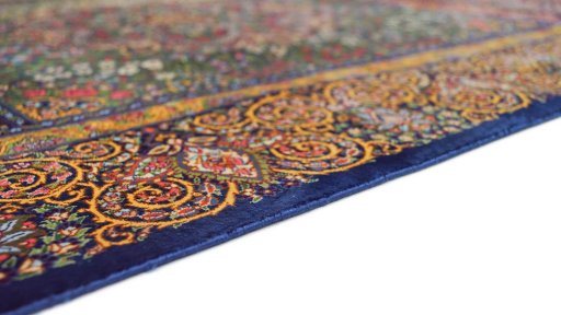 Close-up detail of New Ghom rug from Iran / Persia showing Silk weave