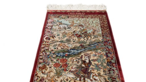 Surface texture of New Ghom rug with natural Silk and intricate pattern