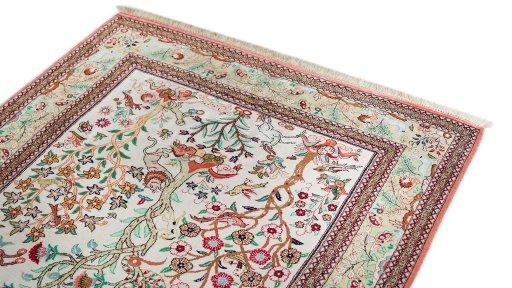 Surface texture of New Ghom rug with natural Silk and intricate pattern