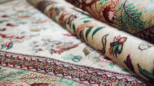 Close-up detail of New Ghom rug from Iran / Persia showing Silk weave