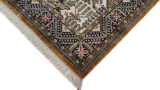 Backside of handmade 1970s Ghom rug showing knot structure and weave density