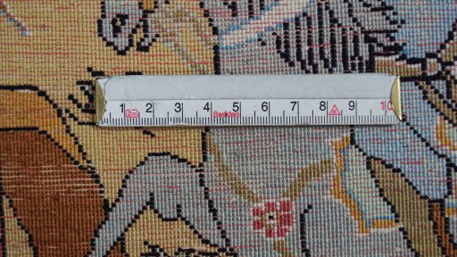 Backside of handmade 1980s Ghom rug showing knot structure and weave density