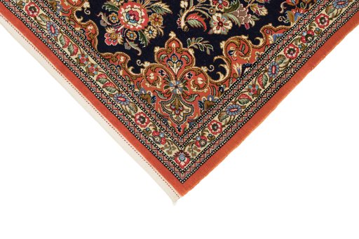 Backside of handmade 1990s Ghom rug showing knot structure and weave density