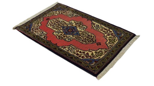 Close-up detail of 1990s Ghom rug from Iran / Persia showing Wool weave