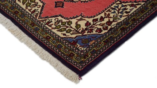 Surface texture of 1990s Ghom rug with natural Wool and intricate pattern