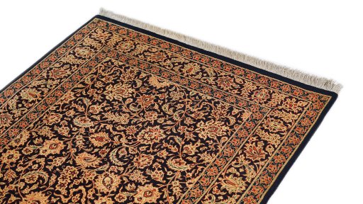 Surface texture of New Ghom rug with natural Silk and intricate pattern