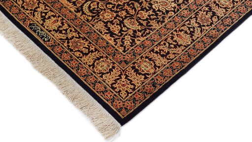 Backside of handmade New Ghom rug showing knot structure and weave density