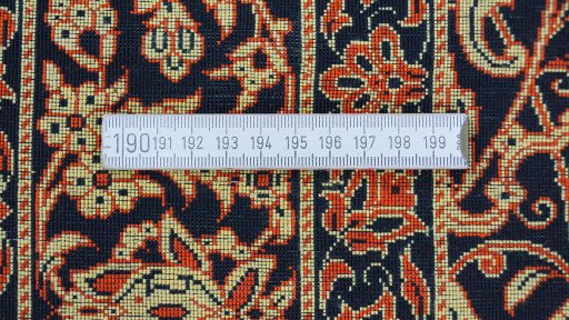 Close-up detail of New Ghom rug from Iran / Persia showing Silk weave