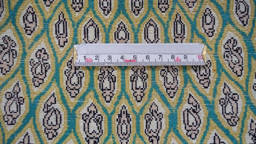 Surface texture of 1990s Ghom rug with natural Silk and intricate pattern