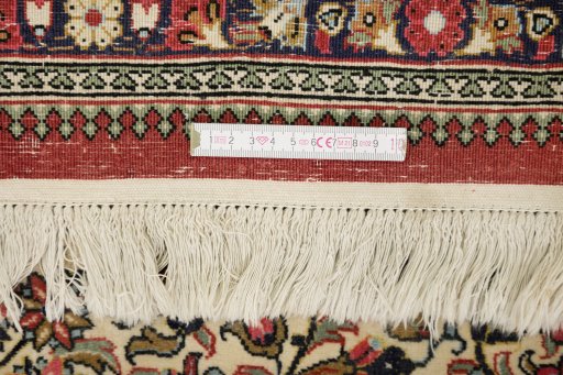 Full view of 1980s Ghom rug from Iran / Persia, 307 × 215 cm in Cream tones