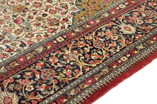 Central medallion detail of 1980s Ghom rug from Iran / Persia