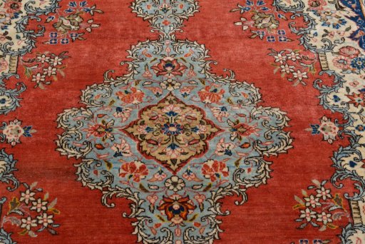 Surface texture of 1950s Ghom rug with natural Cork and intricate pattern