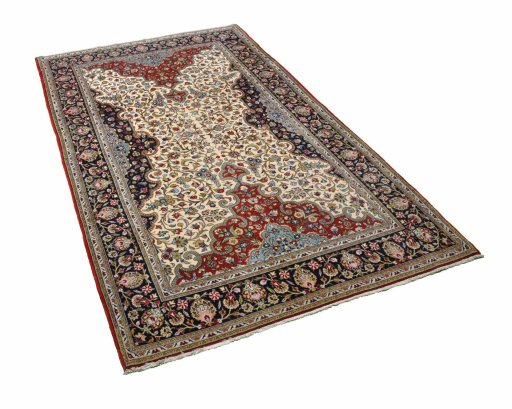 Corner detail of 2000s Ghom rug showing border pattern and Cork pile