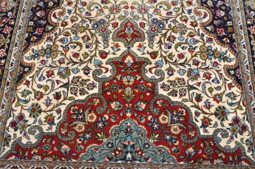Surface texture of 2000s Ghom rug with natural Cork and intricate pattern