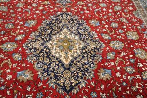 Corner detail of 1970s Ghom rug showing border pattern and Wool pile