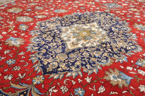 Close-up detail of 1970s Ghom rug from Iran / Persia showing Wool weave