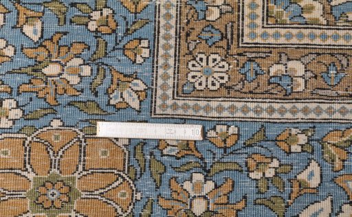 Close-up detail of 1970s Ghom rug from Iran / Persia showing Wool weave